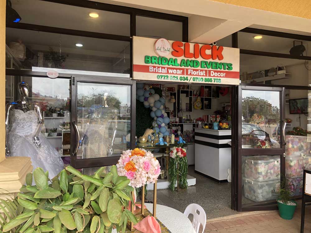 Bridal Services in Kampala Uganda. Slick Bridal And Events Uganda Services Offered: Bridal Wear, Bridal Gowns, Bridesmaid Dresses, Dresses for Wedding, Event Decor, Florist, Gift Shop at Akamwesi Shopping Mall in Kampala Uganda. Ugabox