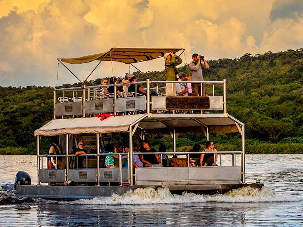 Boat Cruises Africa. African Safari Activities. Visit: Tourismug.com | Tourism Africa. Top Tours And Travel Destinations Africa: Uganda, Rwanda, Kenya, Tanzania, South Africa, Namibia, Botswana, Morocco, Zimbabwe, Zambia, Eswatini, Egypt, Mauritius, Lesotho, Ivory Coast, Tunisia, Mozambique, Zanzibar, Seychelles, Madagascar, Malawi, Ugabox