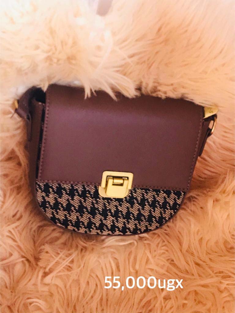 Handbags for Sale in Kampala Uganda. Designer Stylish and Trendy Ladies' Handbags | Women's Bags | Birthday Gift Bags | Order Now for Delivery in Kampala. Calls: +256 781 712 913, Whatsapp: +256 756 758 081. Prettybags, We sell/supply and deliver fashionable womens' bags/ladies' handbags for all events and occasions/women party bags, office bags when you order with us online/call. We are located in Naalya Estate next to Naalya Estate Supermarket 'aka' Lucky7 Supermarket Wakiso Uganda, Ugabox