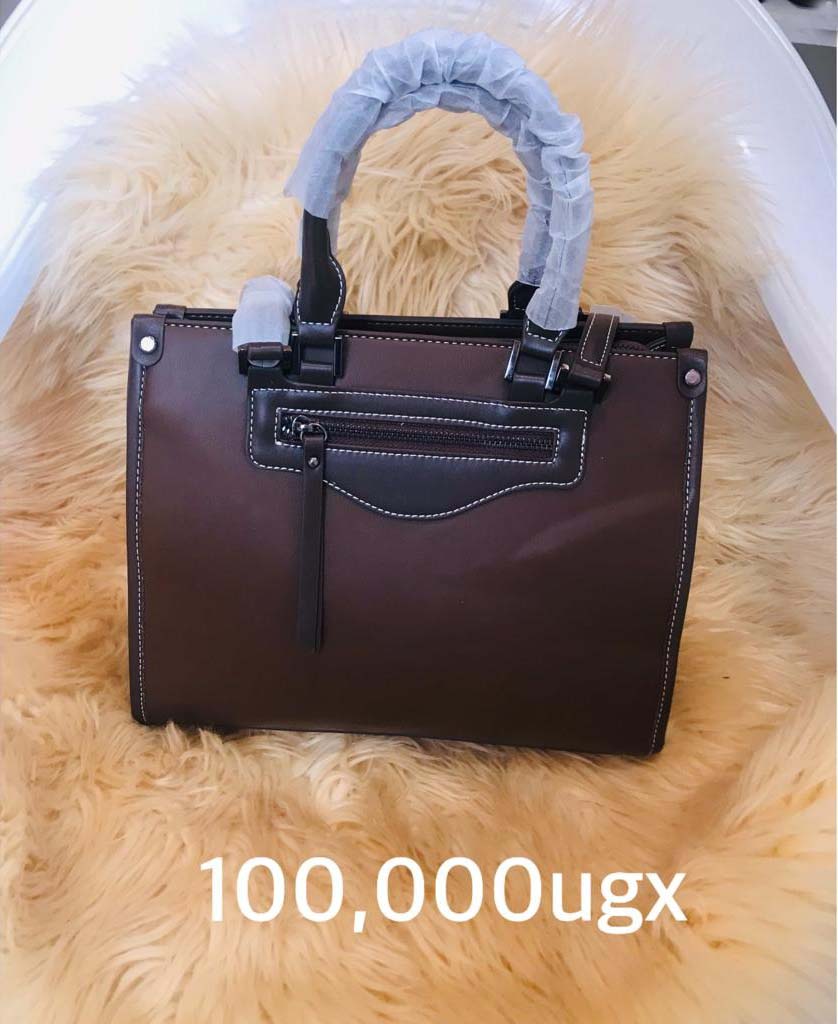 Handbags for Sale in Kampala Uganda. Designer Stylish and Trendy Ladies' Handbags | Women's Bags | Birthday Gift Bags | Order Now for Delivery in Kampala. Calls: +256 781 712 913, Whatsapp: +256 756 758 081. Prettybags, We sell/supply and deliver fashionable womens' bags/ladies' handbags for all events and occasions/women party bags, office bags when you order with us online/call. We are located in Naalya Estate next to Naalya Estate Supermarket 'aka' Lucky7 Supermarket Wakiso Uganda, Ugabox