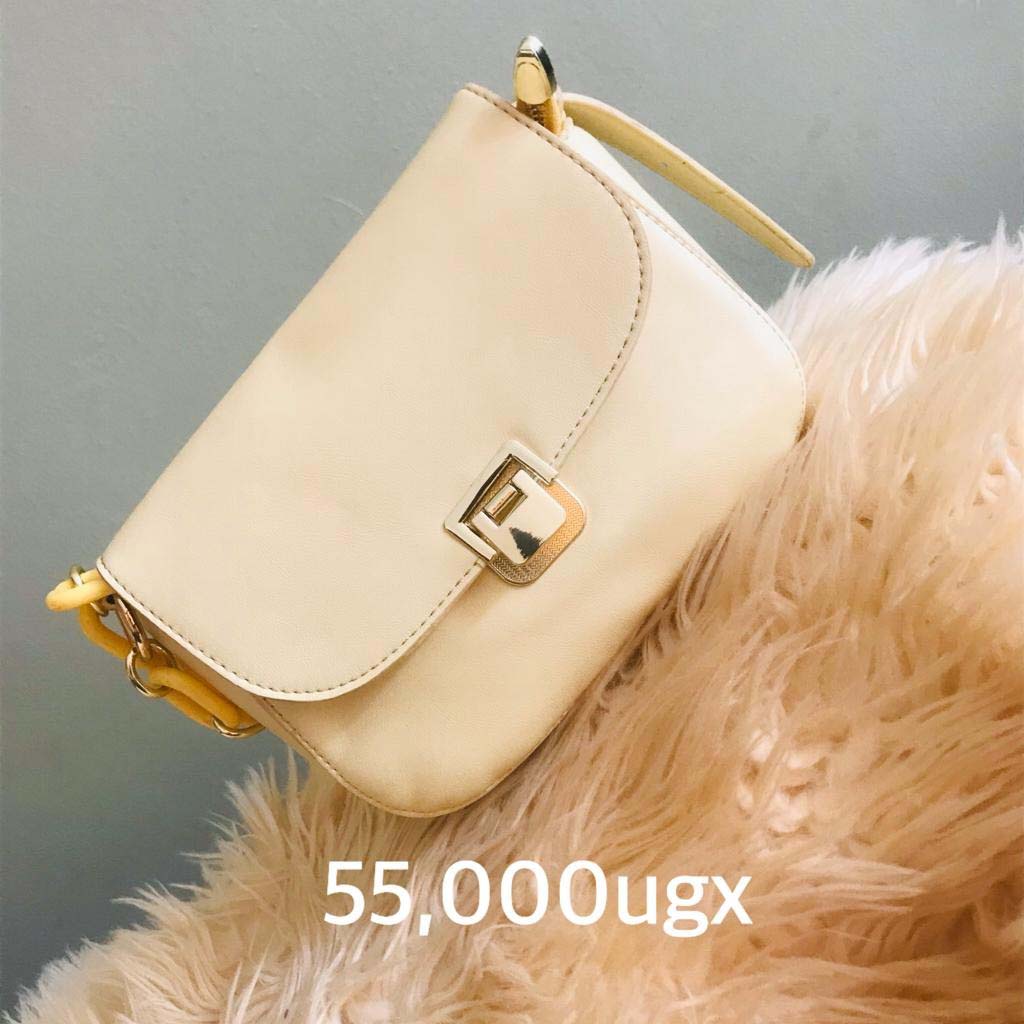 Handbags for Sale in Kampala Uganda. Designer Stylish and Trendy Ladies' Handbags | Women's Bags | Birthday Gift Bags | Order Now for Delivery in Kampala. Calls: +256 781 712 913, Whatsapp: +256 756 758 081. Prettybags, We sell/supply and deliver fashionable womens' bags/ladies' handbags for all events and occasions/women party bags, office bags when you order with us online/call. We are located in Naalya Estate next to Naalya Estate Supermarket 'aka' Lucky7 Supermarket Wakiso Uganda, Ugabox