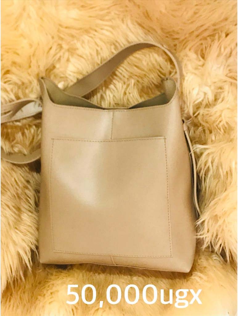 Handbags for Sale in Kampala Uganda. Designer Stylish and Trendy Ladies' Handbags | Women's Bags | Birthday Gift Bags | Order Now for Delivery in Kampala. Calls: +256 781 712 913, Whatsapp: +256 756 758 081. Prettybags, We sell/supply and deliver fashionable womens' bags/ladies' handbags for all events and occasions/women party bags, office bags when you order with us online/call. We are located in Naalya Estate next to Naalya Estate Supermarket 'aka' Lucky7 Supermarket Wakiso Uganda, Ugabox