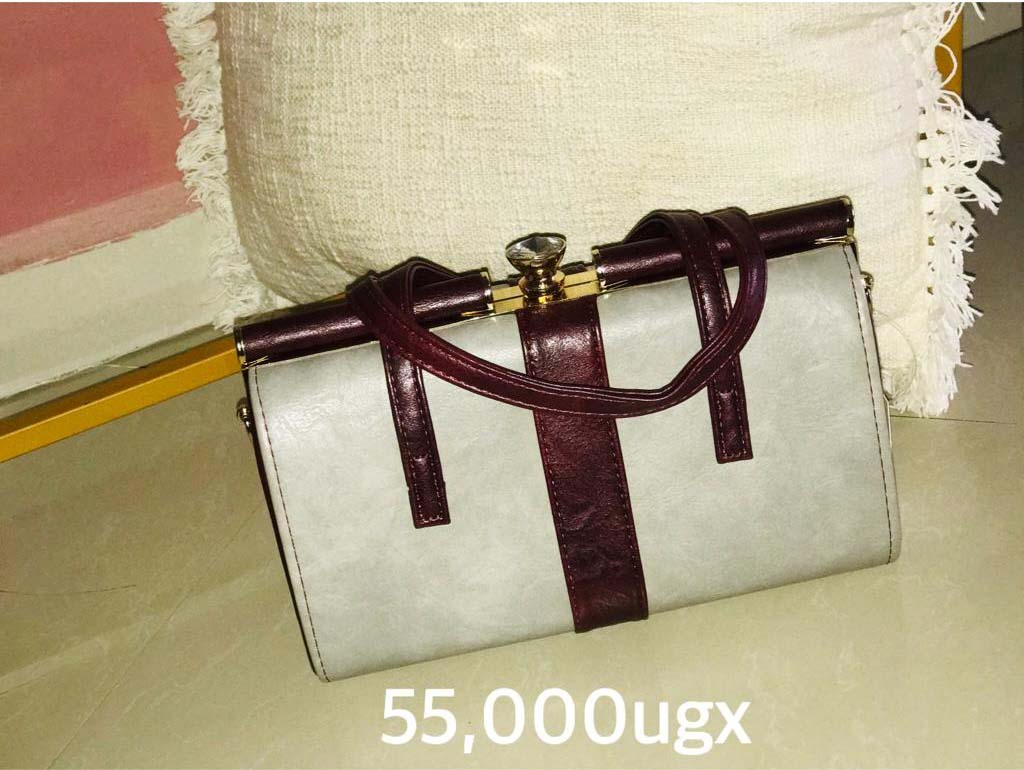 Handbags for Sale in Kampala Uganda. Designer Stylish and Trendy Ladies' Handbags | Women's Bags | Birthday Gift Bags | Order Now for Delivery in Kampala. Calls: +256 781 712 913, Whatsapp: +256 756 758 081. Prettybags, We sell/supply and deliver fashionable womens' bags/ladies' handbags for all events and occasions/women party bags, office bags when you order with us online/call. We are located in Naalya Estate next to Naalya Estate Supermarket 'aka' Lucky7 Supermarket Wakiso Uganda, Ugabox