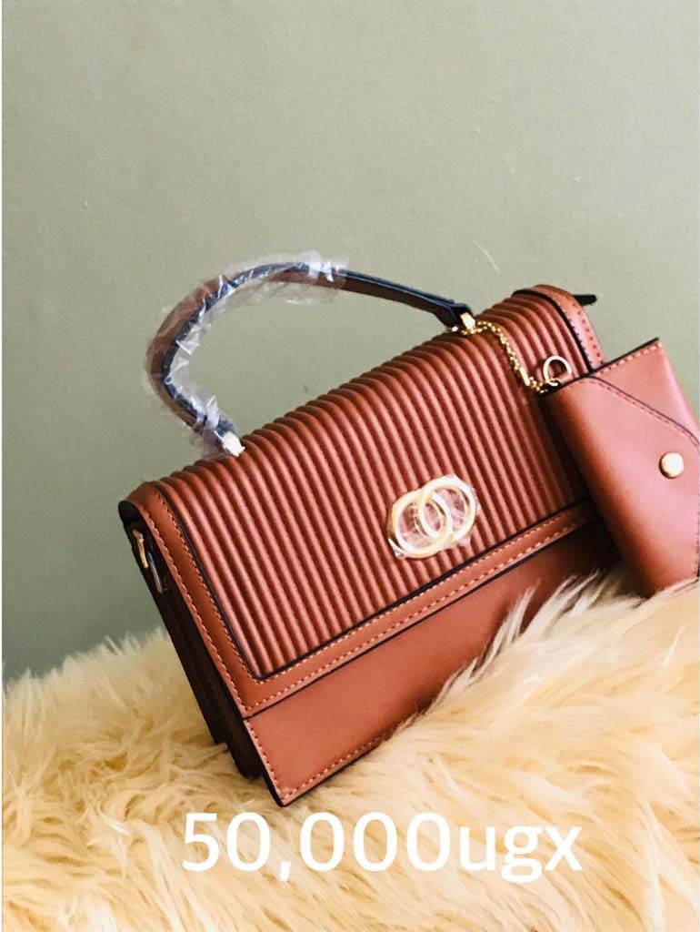 Handbags for Sale in Kampala Uganda. Designer Stylish and Trendy Ladies' Handbags | Women's Bags | Birthday Gift Bags | Order Now for Delivery in Kampala. Calls: +256 781 712 913, Whatsapp: +256 756 758 081. Prettybags, We sell/supply and deliver fashionable womens' bags/ladies' handbags for all events and occasions/women party bags, office bags when you order with us online/call. We are located in Naalya Estate next to Naalya Estate Supermarket 'aka' Lucky7 Supermarket Wakiso Uganda, Ugabox