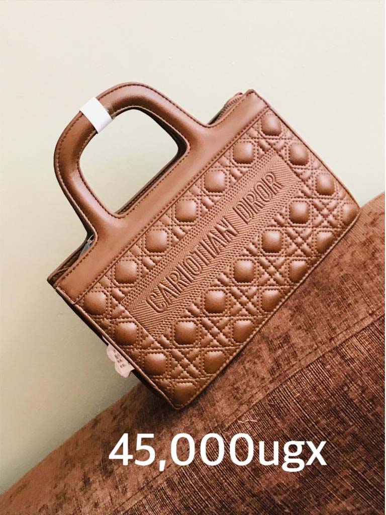Handbags for Sale in Kampala Uganda. Designer Stylish and Trendy Ladies' Handbags | Women's Bags | Birthday Gift Bags | Order Now for Delivery in Kampala. Calls: +256 781 712 913, Whatsapp: +256 756 758 081. Prettybags, We sell/supply and deliver fashionable womens' bags/ladies' handbags for all events and occasions/women party bags, office bags when you order with us online/call. We are located in Naalya Estate next to Naalya Estate Supermarket 'aka' Lucky7 Supermarket Wakiso Uganda, Ugabox