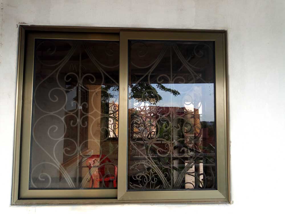 Aluminium Profile Sliding and Fixed Windows in Kampala Uganda, Aluminium Design Works/Installation and Glass Works in Uganda, Luxury Aluminium and Glass Solutions Uganda, Ugabox