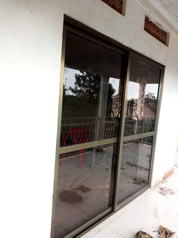 Aluminium Profile Sliding Doors in Kampala Uganda, Aluminium Design Works/Installation and Glass Works in Uganda, Luxury Aluminium and Glass Solutions Uganda, Ugabox