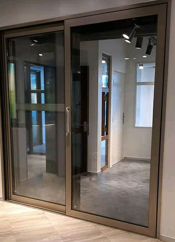 Aluminium Profile Sliding Doors in Kampala Uganda, Aluminium Design Works/Installation and Glass Works in Uganda, Luxury Aluminium and Glass Solutions Uganda, Ugabox