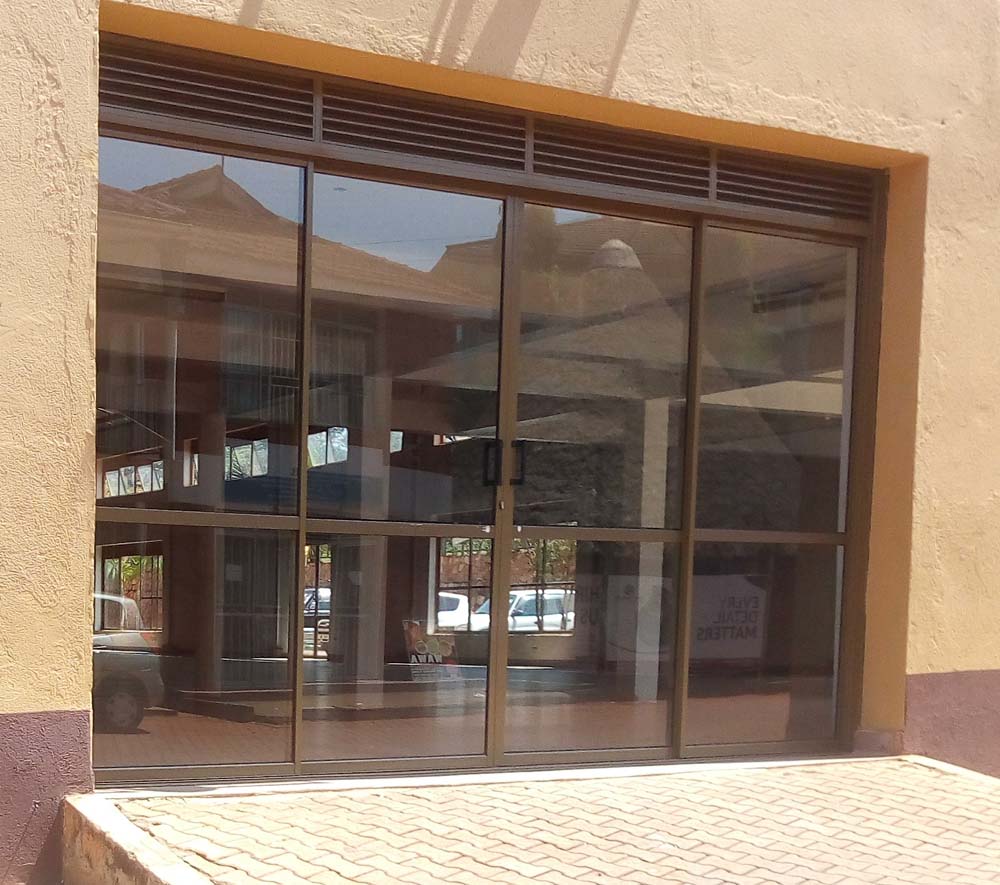 Aluminium Profile Sliding Doors in Kampala Uganda, Aluminium Design Works/Installation and Glass Works in Uganda, Luxury Aluminium and Glass Solutions Uganda, Ugabox