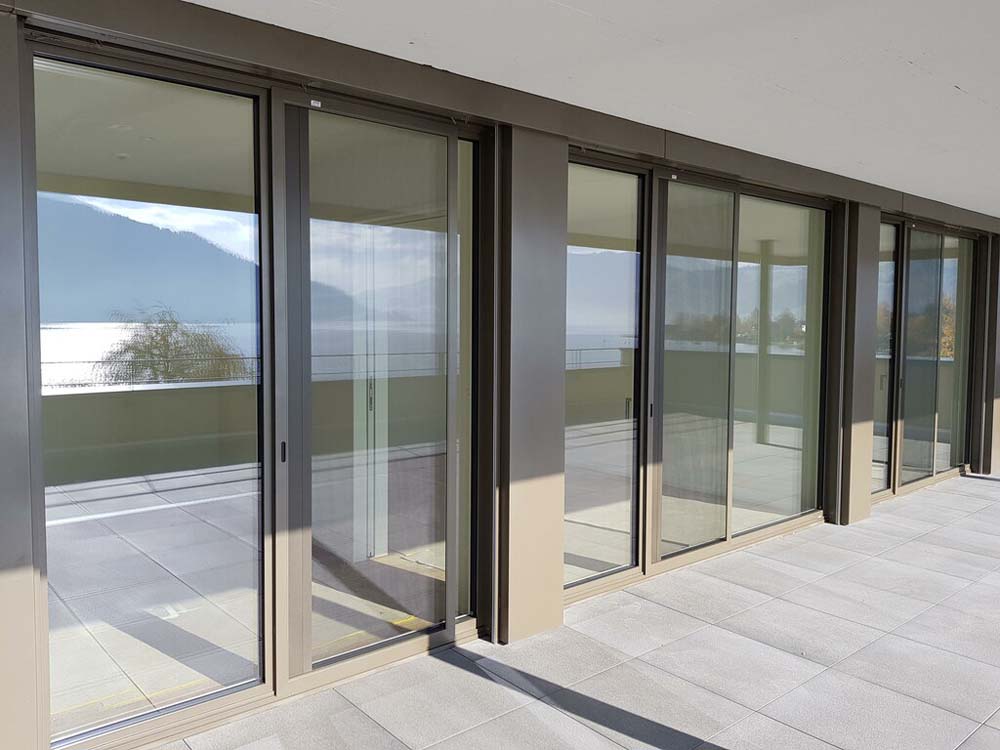 Aluminium Profile Sliding Doors in Kampala Uganda, Aluminium Design Works/Installation and Glass Works in Uganda, Luxury Aluminium and Glass Solutions Uganda, Ugabox