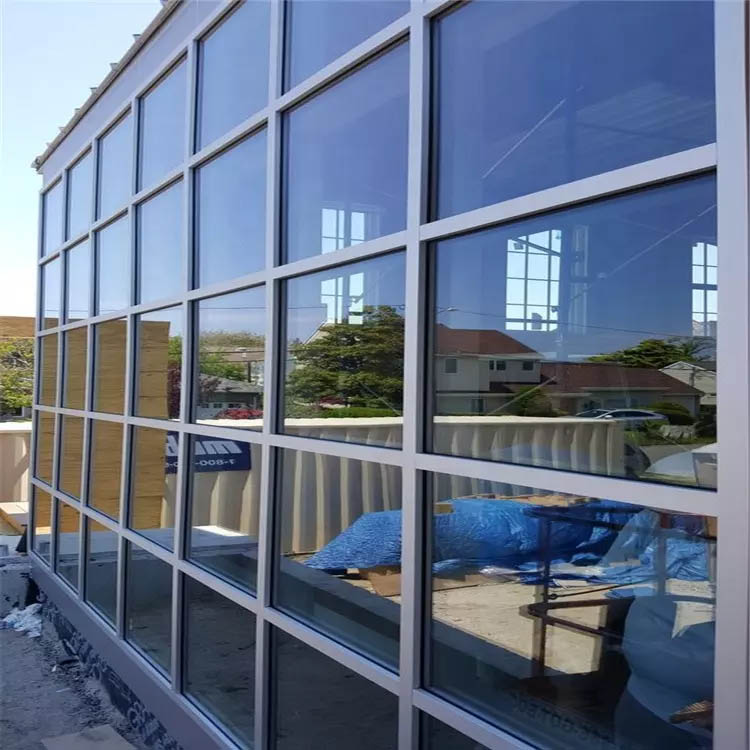 Curtain Wall Cladding Installation in Kampala Uganda, Curtain Wall Facade/Glass Facade in Uganda, Aluminium Design Works/Installation and Glass Works in Uganda, Luxury Aluminium and Glass Solutions Uganda, Ugabox