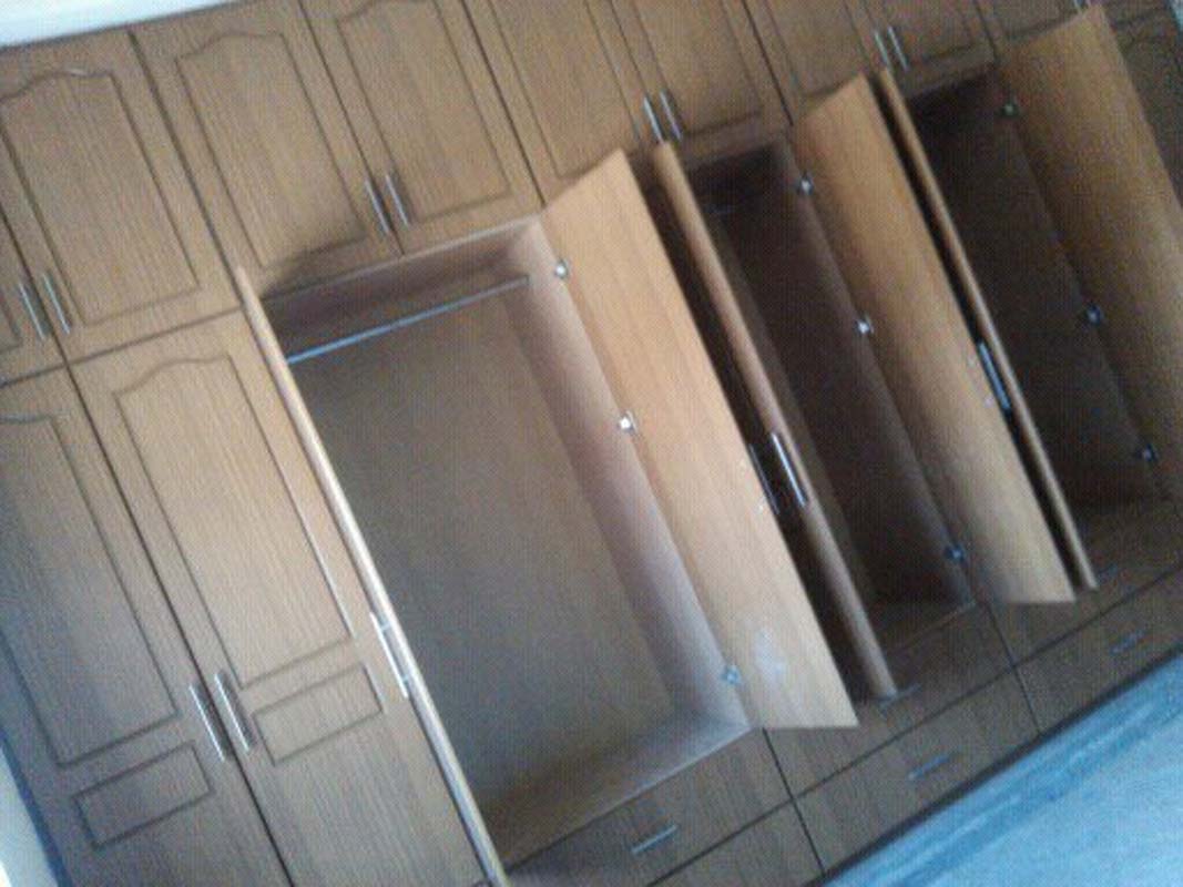 Fitted Wardrobes in Kampala Uganda, Fitted Clothes Closet in Uganda, Hard Wood and Softwood Wardrobes in Uganda, Carpentry & Wood Works in Uganda, Oldvoi Uganda Limited Construction Company, Ugabox