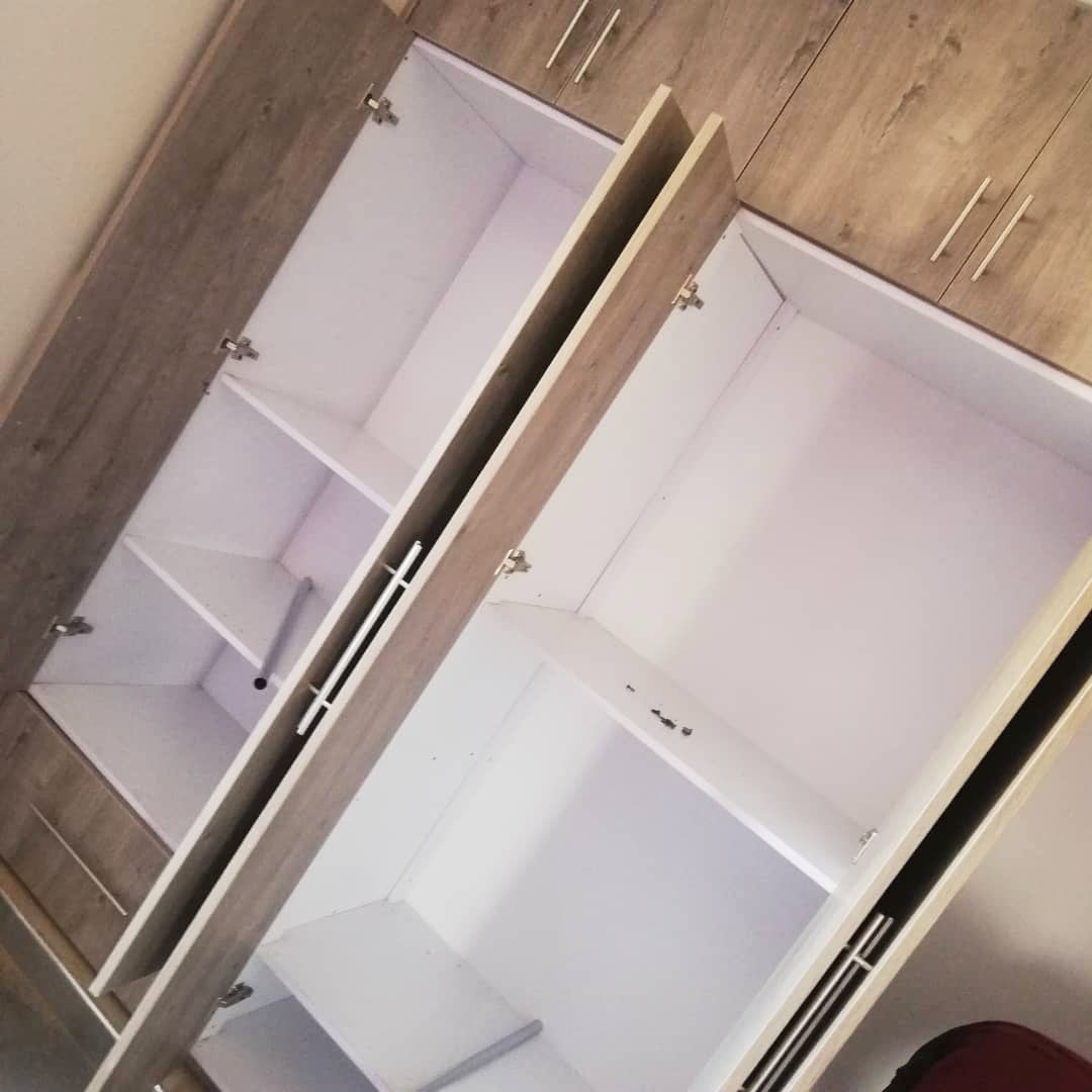 Fitted Wardrobes in Kampala Uganda, Fitted Clothes Closet in Uganda, Hard Wood and Softwood Wardrobes in Uganda, Carpentry & Wood Works in Uganda, Oldvoi Uganda Limited Construction Company, Ugabox