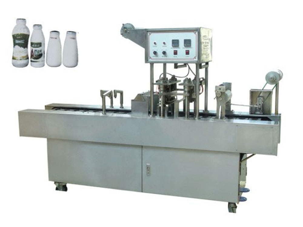 Automatic Milk Bottle Filling and Sealing Machine/Foil Cut Form Seal At Same Time, Save foil device in Uganda. Automatic Milk Bottle Filling and Sealing Machine in Kampala Uganda. F and B Solutions Uganda for all your Food and Beverages Industry Machines, Food & Drinks/Liquids Machines Industry Kampala Uganda, East Africa: Kigali-Rwanda, Nairobi-Mombasa-Kenya, Juba-South Sudan, DRC Congo, Ugabox