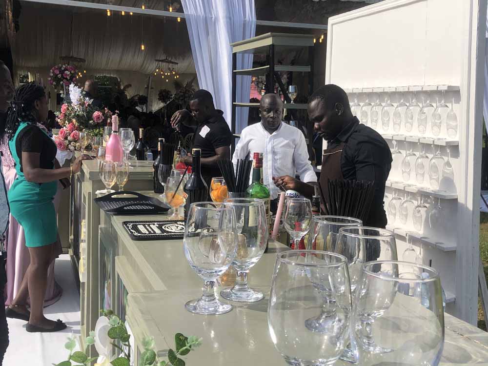 Wedding Reception Venue/Wedding Gardens in Kampala Uganda. Create Your Dream Wedding or Party Event Amidst Lush Gardens/Trees. Corporate Event Venue, Outdoor Wedding Venue, Bridal Gardens And Picnic Gardens, Party Venue, Event Venue for Private And Public Functions: Wedding Venue, Introduction Venue, and Birthday Parties Venue, Kuhingira/Give Away Ceremony Venue, Baby Showers And Bridal Showers Venue in Kampala. For Booking/Reservation Contact Akamwesi Gardens Management Located at Akamwesi Shopping Mall in Kyebando Along Gayaza Road in Kampala Uganda. Ugabox