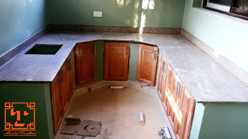 Granite & Terrazzo Uganda, Kitchen Tops, Staircases, Counter Tops, Reception Tops, Granite Graves, Vanity Tops, Window Sills, Cash Counters, Terrazo Materials, White Cement Importer in Kampala Uganda, Grave Engraving, Marble Tiles in Kampala Uganda, Ugabox