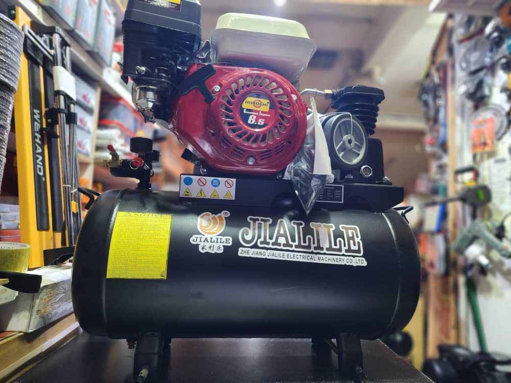 Price in Uganda for Air Compressor. UGX: 000. Air Compressor Portable 50 Litres 6.5HP Petrol Engine With Heavy Duty Piston Head for Sale in Kampala Uganda. Air Compressor Application: For Paint Spraying, Car Tyre Inflation, For Furniture And Metal Workshops. Machine World Uganda, Leading Air Compressors Company in Uganda: Supplier, Importer, Distributor, Assembler and Installer of Domestic and Industrial Air Compression Machinery in Kampala-Uganda, East Africa: Kigali-Rwanda, Nairobi-Mombasa-Kenya, Juba-South Sudan, DRC-Congo, Tanzania. Ugabox Machinery Marketing Platform Uganda | Ugabox.com