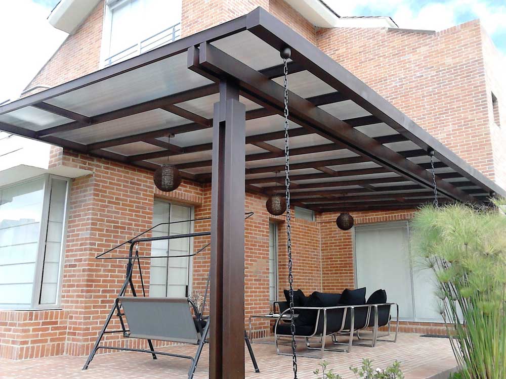 Polycarbonate Roof/Polycarbonate Roof Shade in Kampala Uganda. Glass Roof/House Shade Installation. Other Services: Wood/Sttel/Aluminium Pergola Design and Installation, Aluminium Roofs, Glass Roofs, Aluminium Doors and Windows, Home Interior and Exterior Design, Aluminium Products, Aluminium Construction, Aluminium House, Aluminium Building, Aluminium/Metal/Steel Fabrication in Kampala Uganda, Ugabox