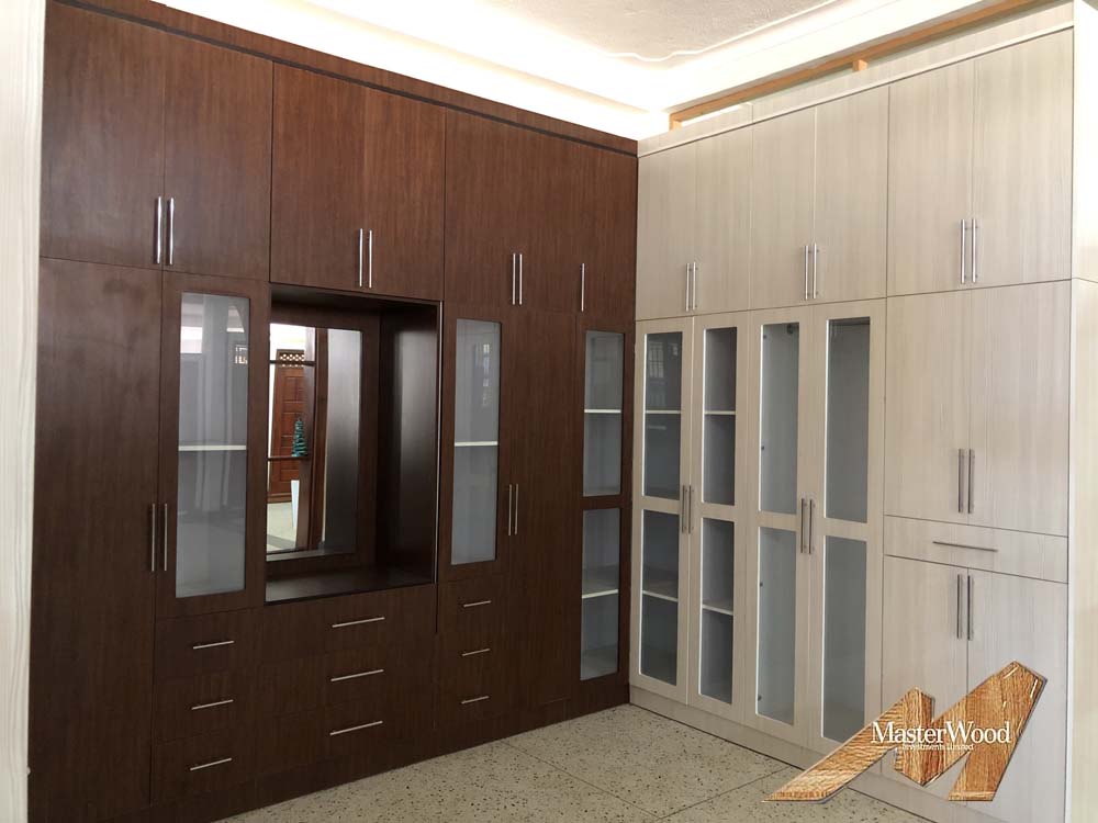 Wardrobes for Sale in Kampala Uganda. Home/House Wardrobes Installation in Kampala Uganda. Visit our Showroom in Luzira Kampala Uganda to See All Our Wood Products Or Give Us a Call: +256 393 266 386 Masterwood Investments Limited Uganda. Ugabox