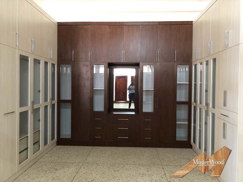 Wardrobes for Sale in Kampala Uganda. Home/House Wardrobes Installation in Kampala Uganda. Visit our Showroom in Luzira Kampala Uganda to See All Our Wood Products Or Give Us a Call: +256 393 266 386 Masterwood Investments Limited Uganda. Ugabox