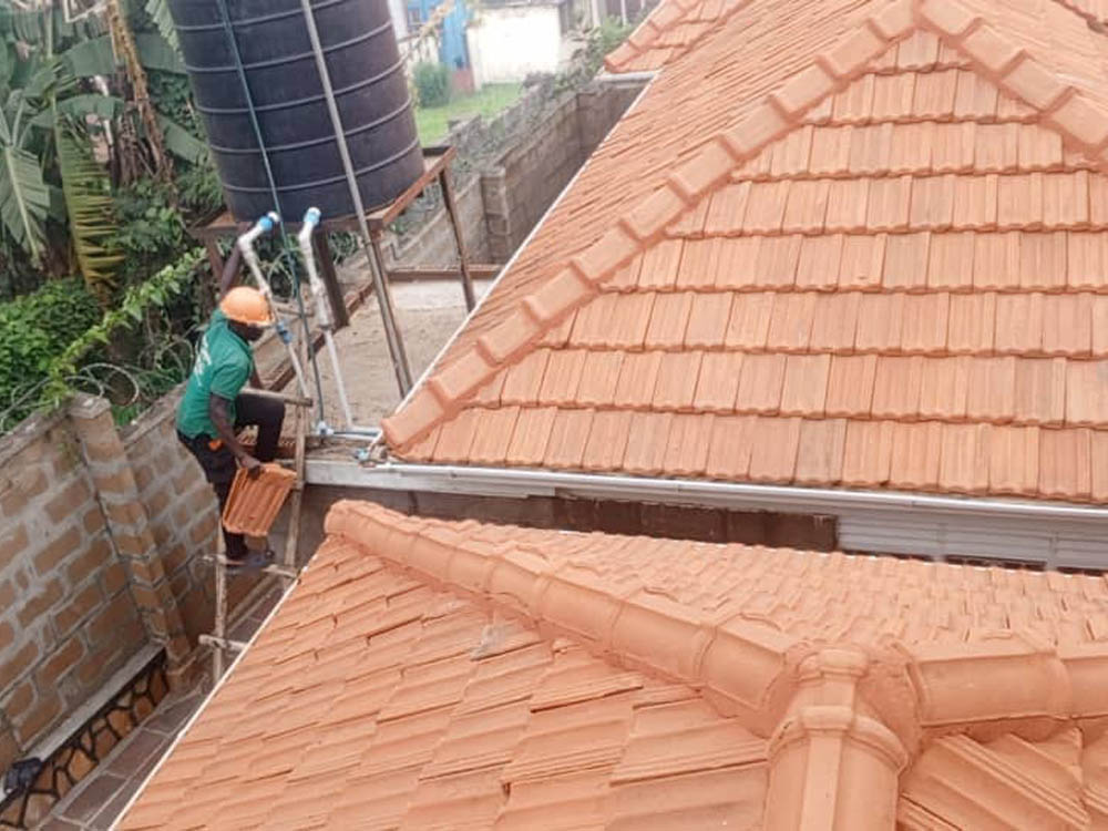 Roof Repairs Uganda. Roof Renovation Services. Roof Maintenance Company To Stop Or Prevent Roof Leakages In Uganda. Timber/Wood And Metal/Steel Roof Tiles And Iron Sheets Roof Maintenance Services In Kampala Uganda. Macoi Roofings Uganda For Professional Roofing Services In Kampala Uganda. Ugabox
