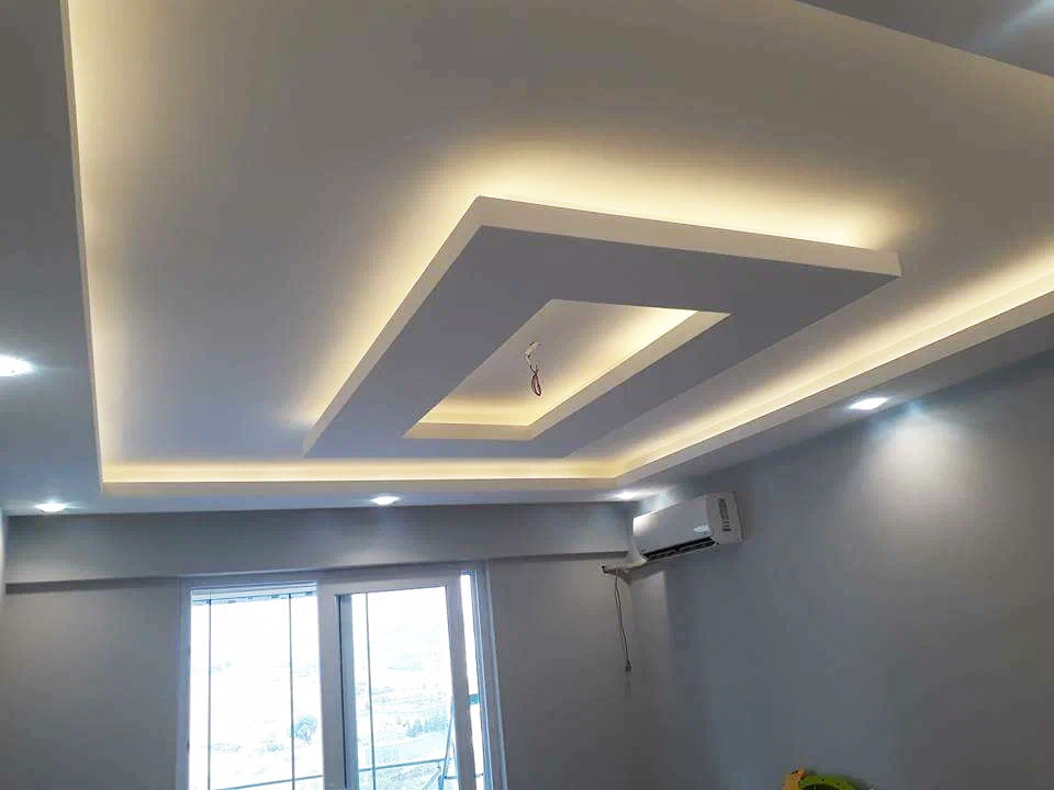 Gypsum ceiling design in Kampala Uganda. Stylish modern gypsum design installation in Uganda. Trust Interiors Uganda. Leading interior design company in Uganda. Services: Interior design services, installation services, manufacturing of modern stylish furniture products in Uganda, East Africa. ugabox.com