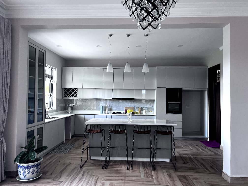 Kitchen cabinets design in Kampala Uganda. Wood cabinets installation. Trust Interiors Uganda. Leading interior design company in Uganda. Services: Interior design services, installation services, manufacturing of modern stylish furniture products in Uganda, East Africa. ugabox.com