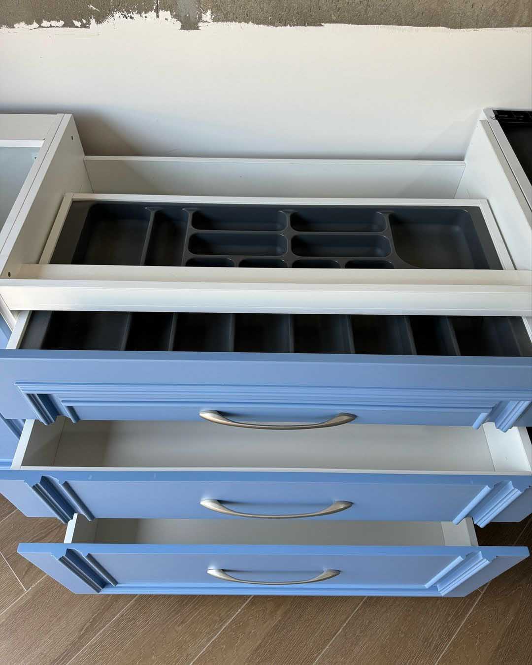 Kitchen cabinets design in Kampala Uganda. Wood cabinets installation. Trust Interiors Uganda. Leading interior design company in Uganda. Services: Interior design services, installation services, manufacturing of modern stylish furniture products in Uganda, East Africa. ugabox.com