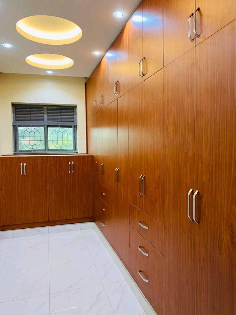 Wardrobe design in Kampala Uganda. Stylish modern wardrobe installation in Uganda. Trust Interiors Uganda. Leading interior design company in Uganda. Services: Interior design services, installation services, manufacturing of modern stylish furniture products in Uganda, East Africa. ugabox.com